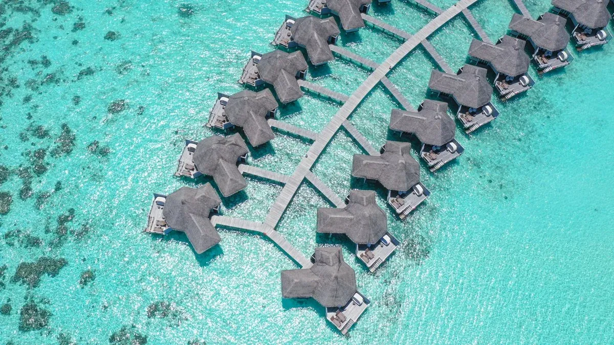 Water villas at Drift Thelu Veliga Retreat, an adults-only South Ari Atoll resort
