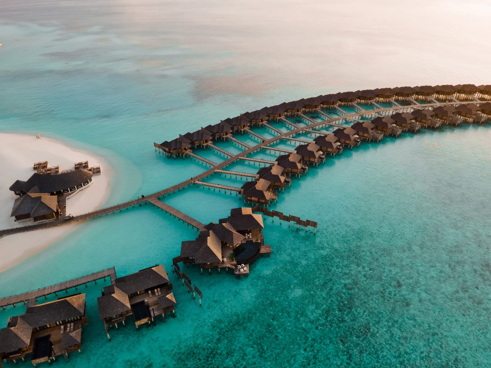 Sun Siyam Iru Fushi — 221-villa private-island resort in Noonu Atoll.