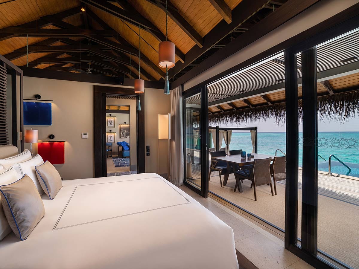 The private-island silhouette of Velaa in Noonu Atoll — beach and overwater villas surrounding the lagoon.