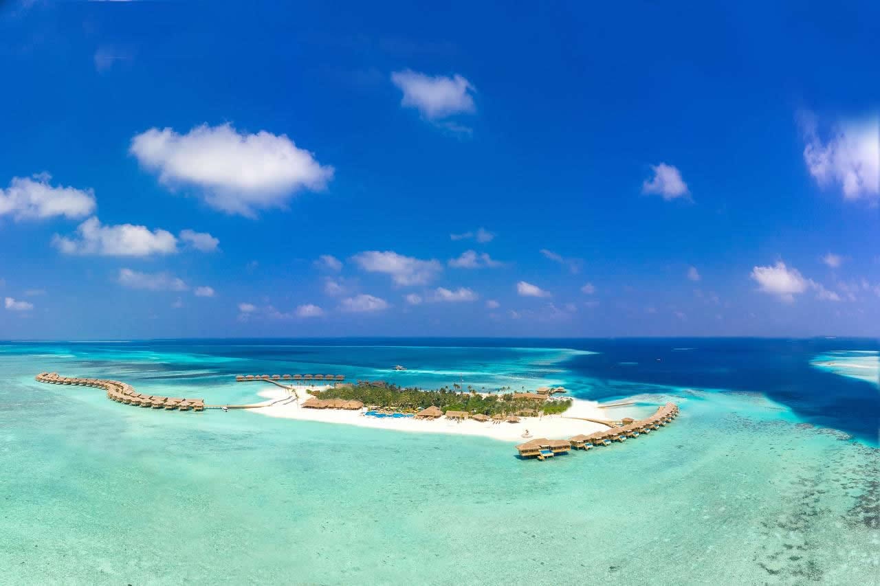 Aerial view of You & Me Maldives, an adults-only resort in Raa Atoll with overwater villas